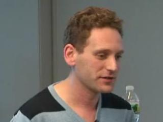 a man looking at the camera