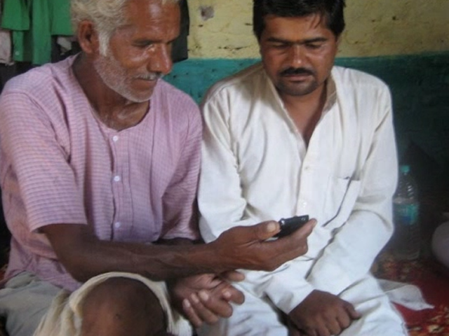 a group of people sitting at a table