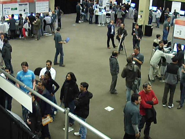 a group of people standing in front of a crowd
