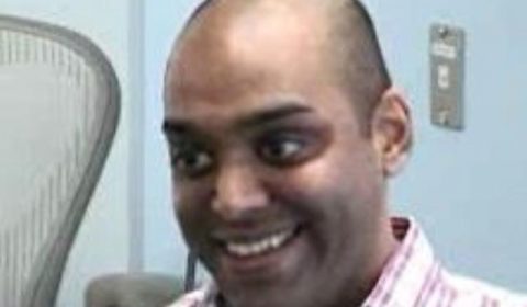 a man smiling for the camera