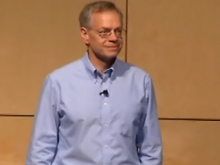 a person standing posing for the camera