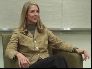 a woman sitting in a chair