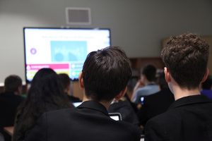 a group of people standing in front of a crowd