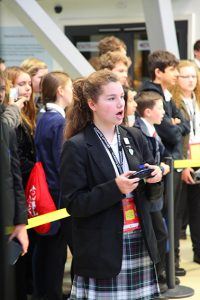 a group of people standing in front of a crowd