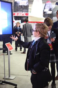 a group of people standing in a room
