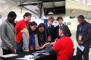 a group of people standing in a room