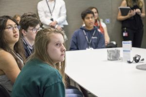 a group of people looking at the camera