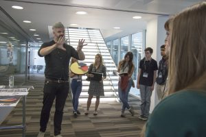 a group of people standing in a room