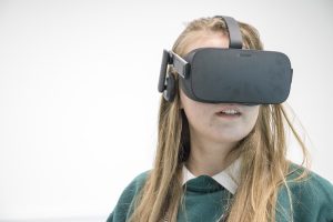 a person wearing a hat and sunglasses