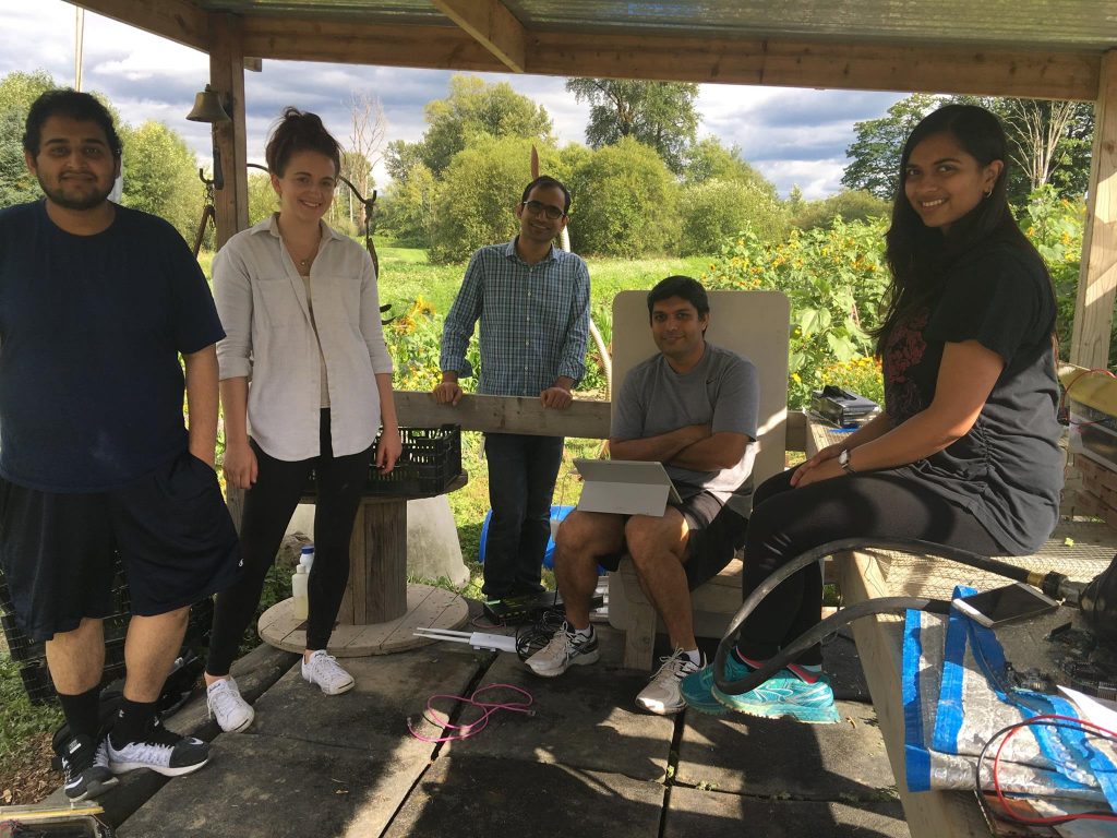 Ranveer Chandra et al. standing in a room