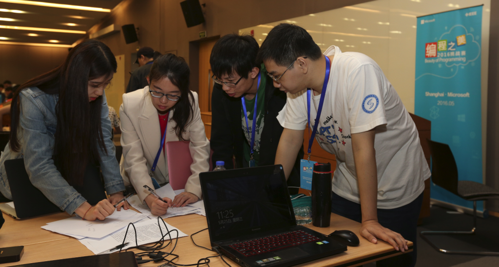 UX designer Xuelun Fu (far left) discussing project idea with team members.