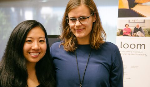 a woman smiling and posing for the camera