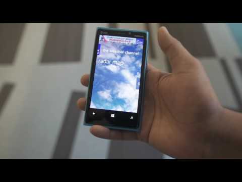 a hand holding a cell phone