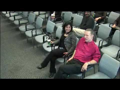 a group of people sitting posing for the camera