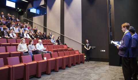 a group of people standing in a room