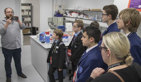 a group of people standing in a room