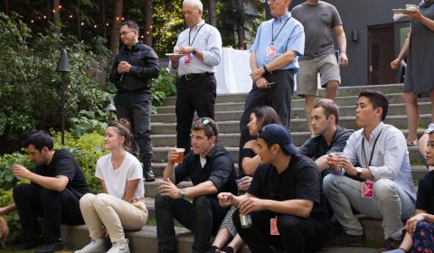 Scott Fisher et al. sitting on a bench
