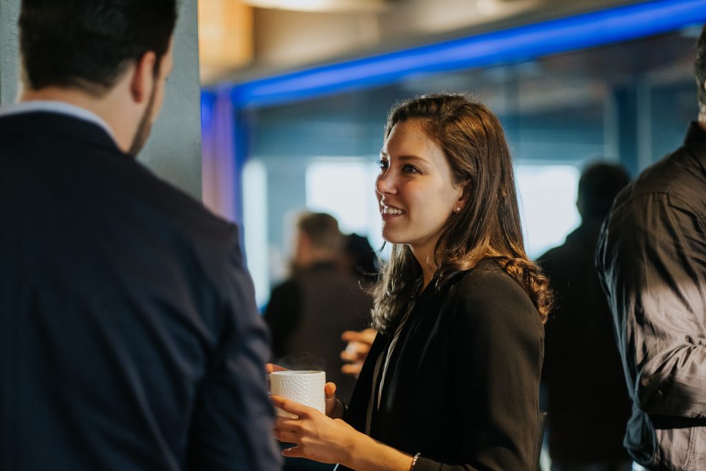 a couple of people that are standing in a room