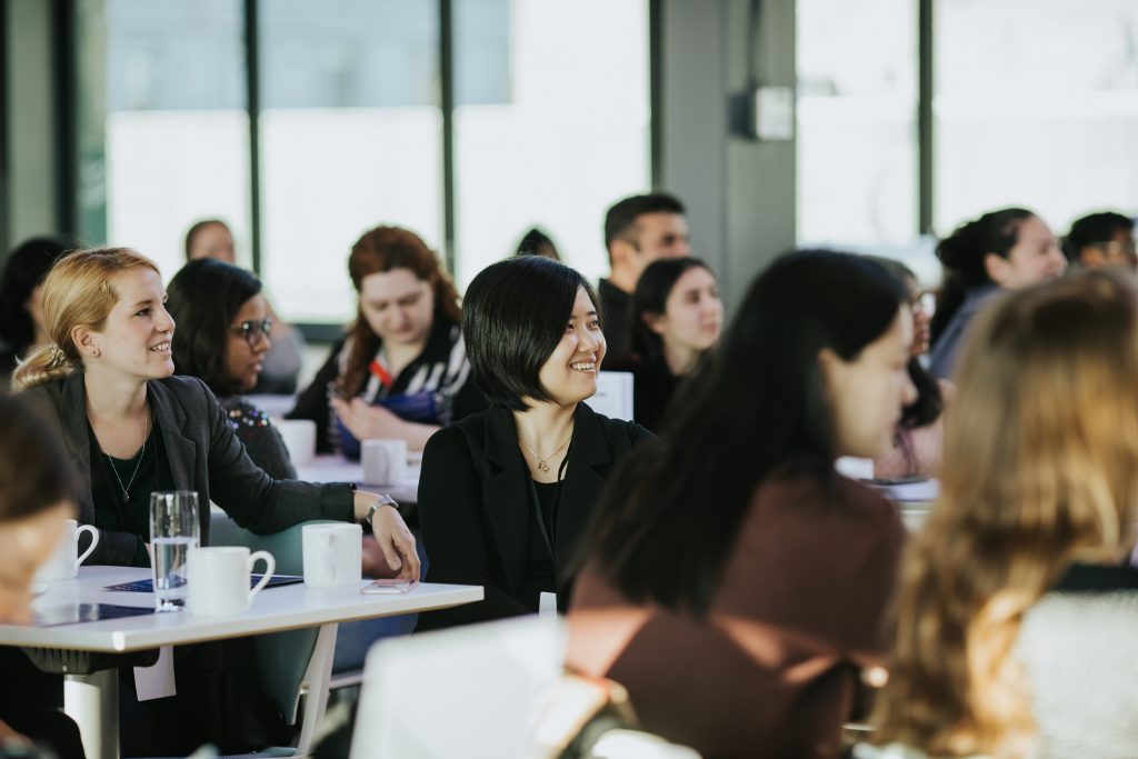 a group of people sitting at a table