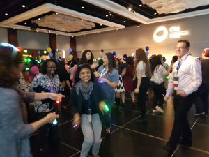 a group of people standing in a room