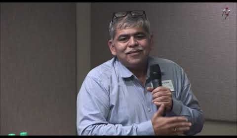 a man smiling for the camera