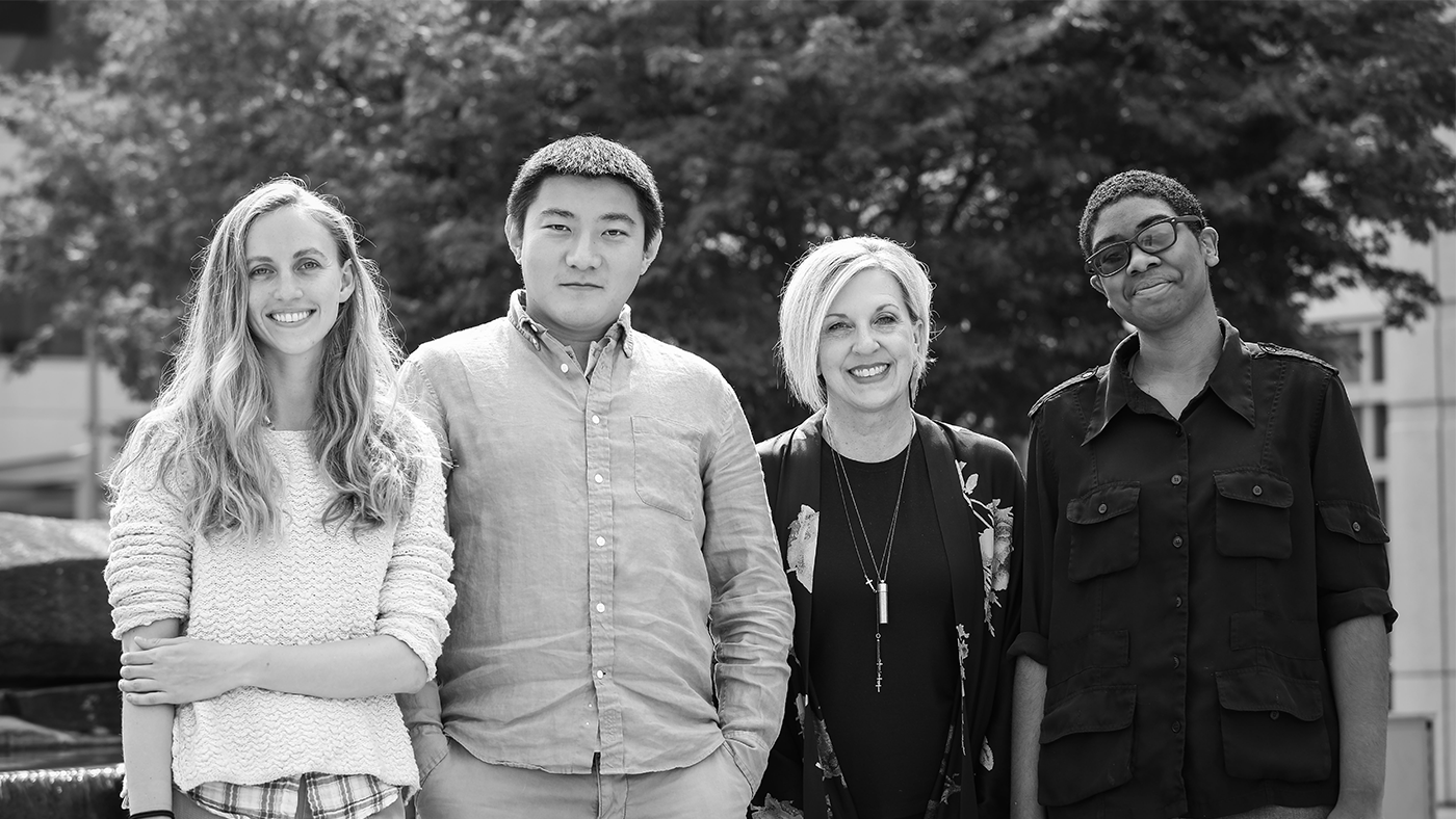 Gretchen Huizinga et al. posing for a photo