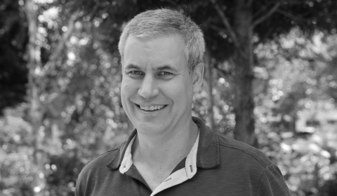 a man smiling for the camera