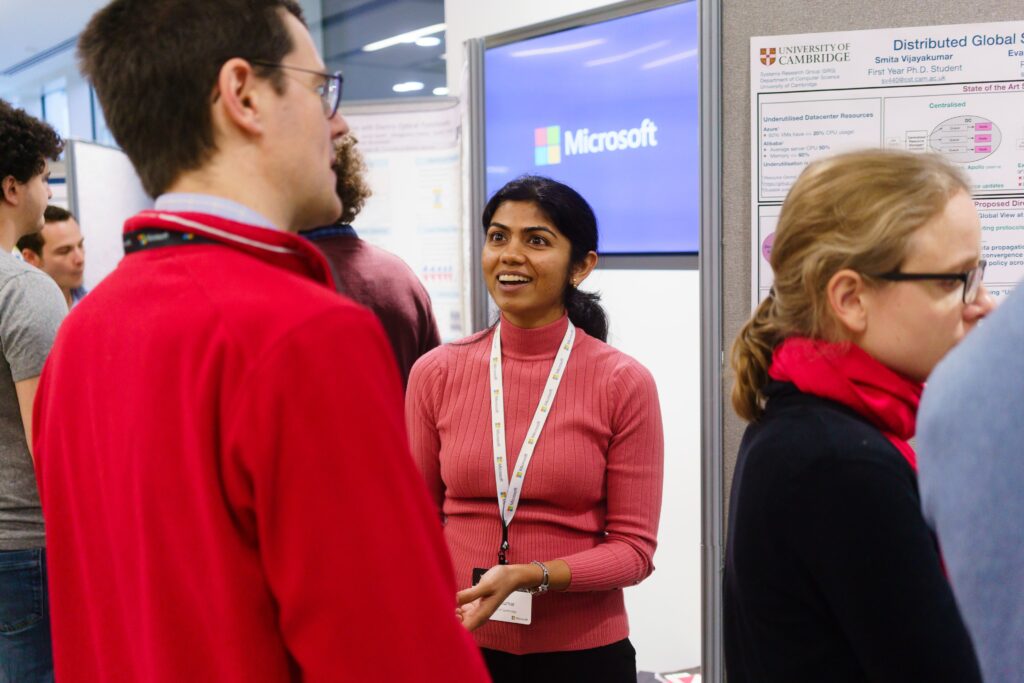 a group of people standing in front of a store