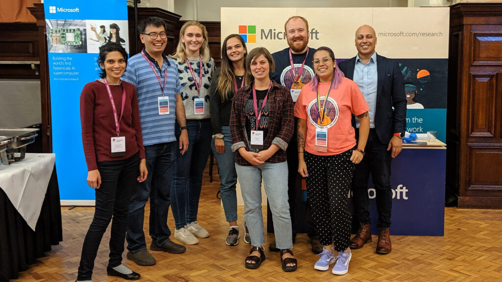 Anna Krystalli from the University of Sheffield (fourth from right) won best poster at the fourth Conference of Research Software Engineering with her poster on pkgreviewr for helping automate the rOpenSci review process for open reproducible research and data access. Pictured with her is a group of Microsoft researchers and engineers (from left): Pashmina Cameron, Kenji Takeda, Camilla Longden, Raluca Georgescu, Matthew Johnson, Tania Allard, and Bhavin Bhagalia.
