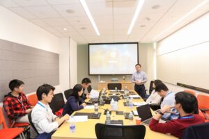 a group of people sitting at a table