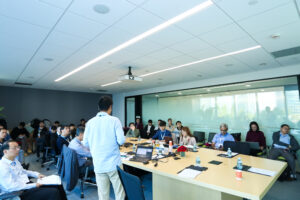 a group of people sitting at a table