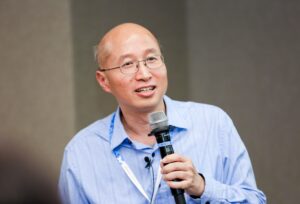 a man holding a guitar