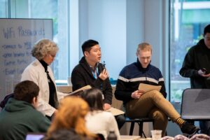 a group of people sitting in chairs