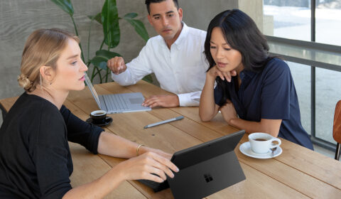 a group of people sitting at a table