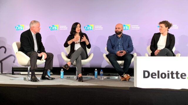 a group of people standing in a room