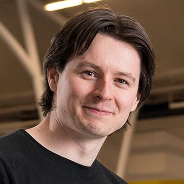 Portrait of Dr. Tommy Thompson from 'AI and Games' and speaker at the Microsoft Research AI and Gaming Research Summit