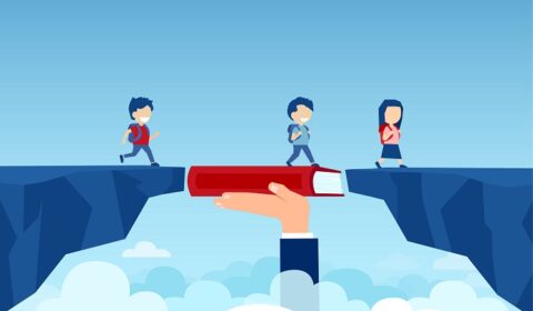 hand holding a book bridging the gap in primary education for children passing by