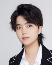 a young man wearing a suit and tie