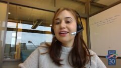 a woman smiling for the camera