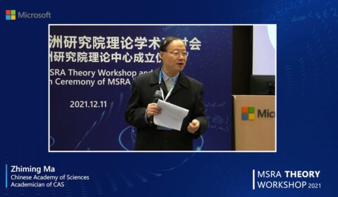 a screen shot of a man in a suit and tie