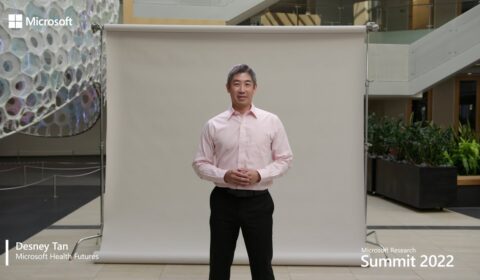 Desney Tan standing in a room