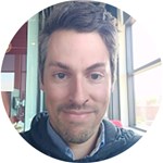 a man smiling for the camera