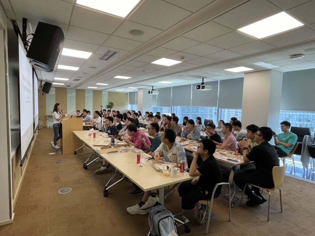 a group of people sitting at a table in a room