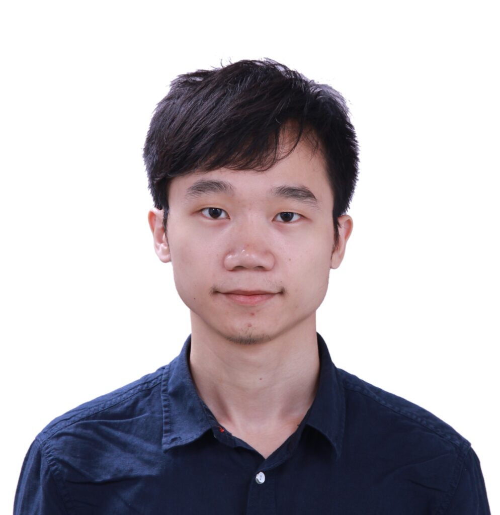 a young man wearing a blue shirt