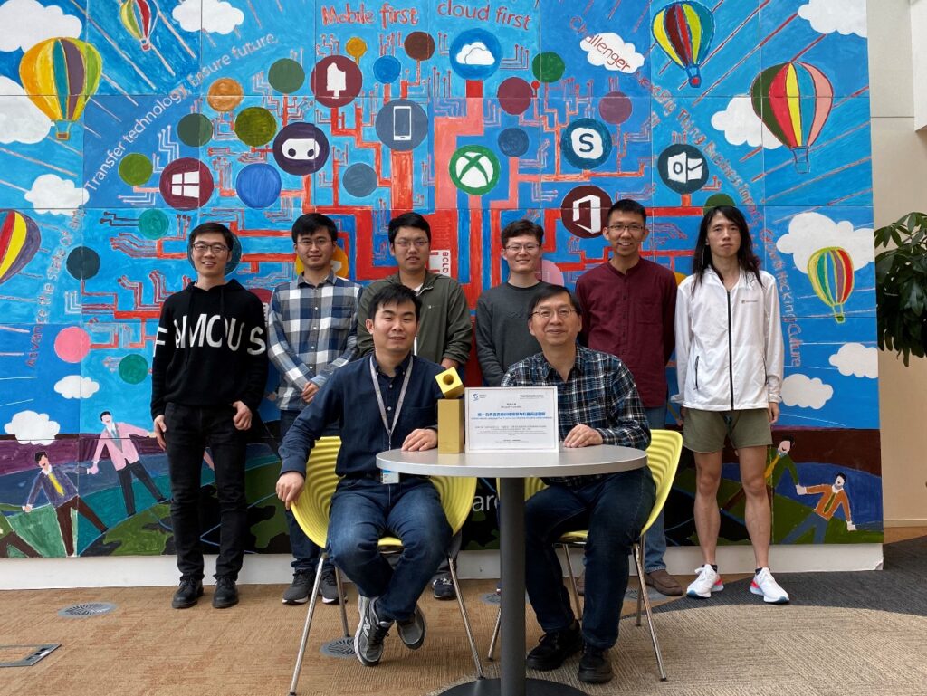 a group of people posing for the camera