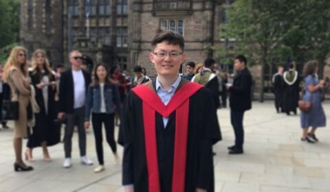 a group of people walking down a street
