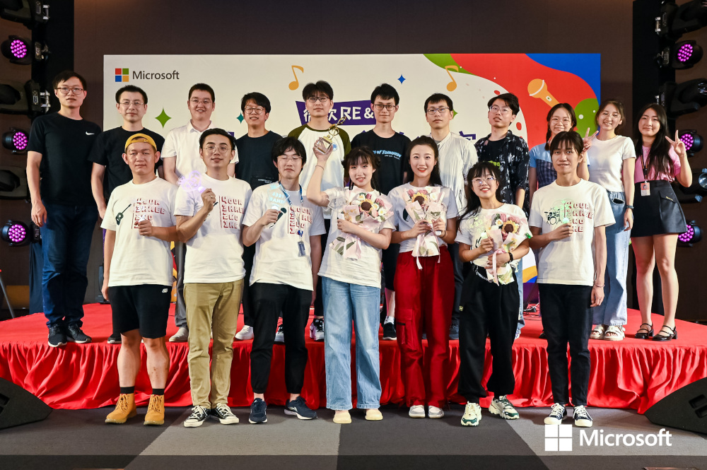 a group of people posing for a photo