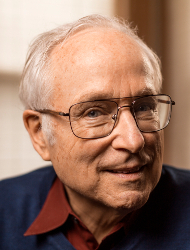 Butler Lampson wearing glasses and looking at the camera