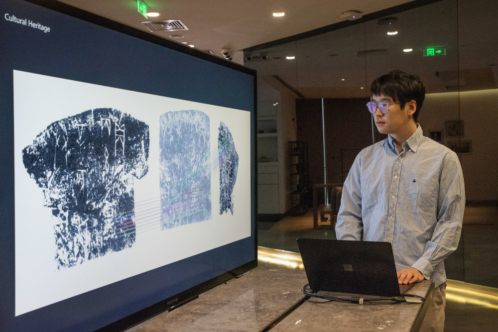 a person is watching a screen