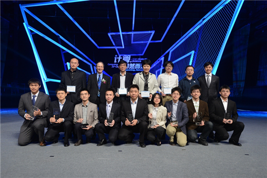 a group of people posing for a photo